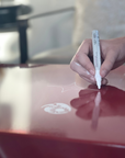 Wet erase marker used on Heartthrob Red side table with blued steel base and porcelain enamel top